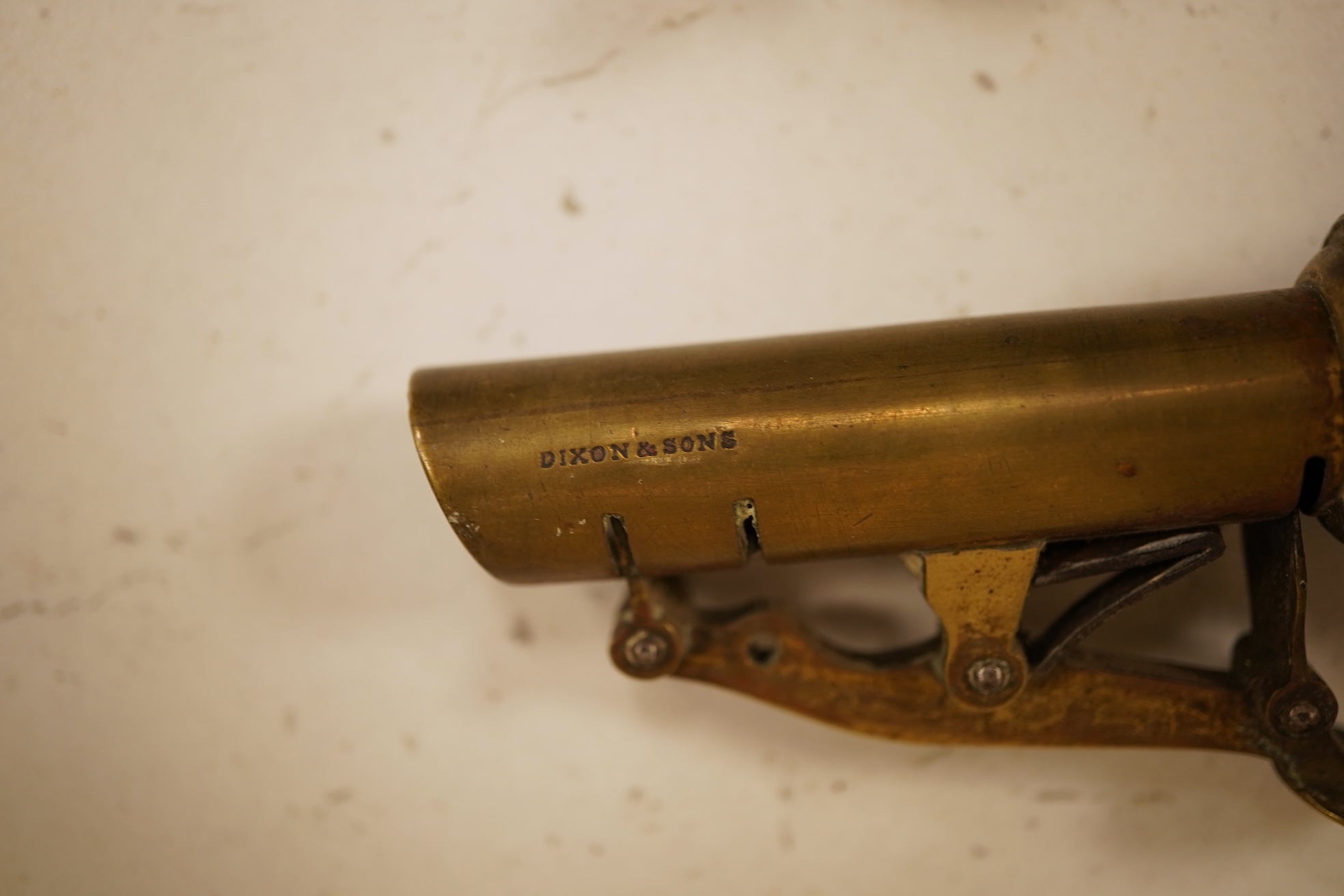 A pair of 19th century pocket pistols, shot flask and a brass musket, 81cm in length